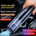 Handheld vacuum cleaner with features highlighted on a dark background