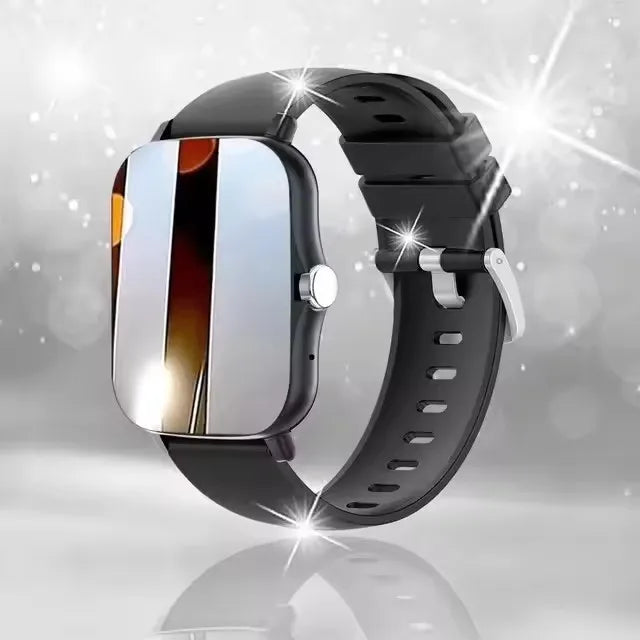 Smartwatch with a black strap on a reflective surface with a sparkling background.
