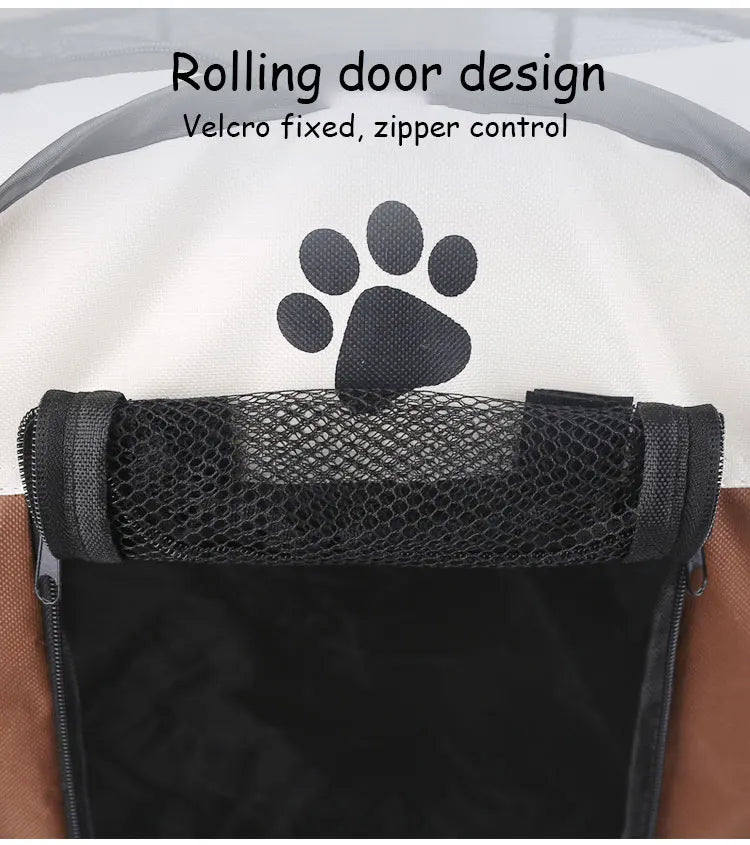 Black pet carrier with mesh top and rolling door design, featuring a paw print graphic