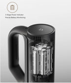 Black handheld vacuum cleaner with clear compartment showing internal components on a light gray backgroun