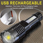 USB rechargeable flashlight with charging cable on a textured surface