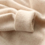 Close-up of beige fabric with a focus on texture and color.