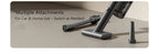 Vacuum cleaner with attachments on a neutral background