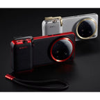 Black and red Xiaomi camera with a strap on a black background