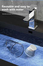 Cleaning brush and glass with text 'Reusable and easy to wash with water' on a dark backgroun