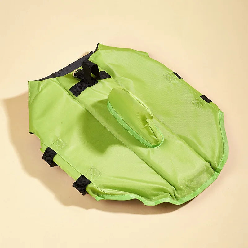 Green inflatable raft on a beige background