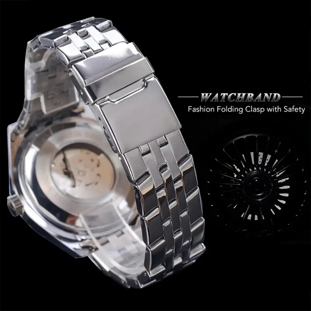 Silver watchband with folding clasp on a black background
