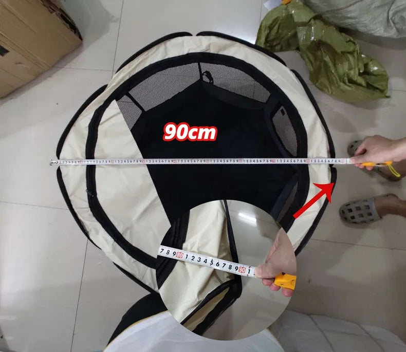 Measurement of a round object with a tape measure showing 90cm on a tiled floor.