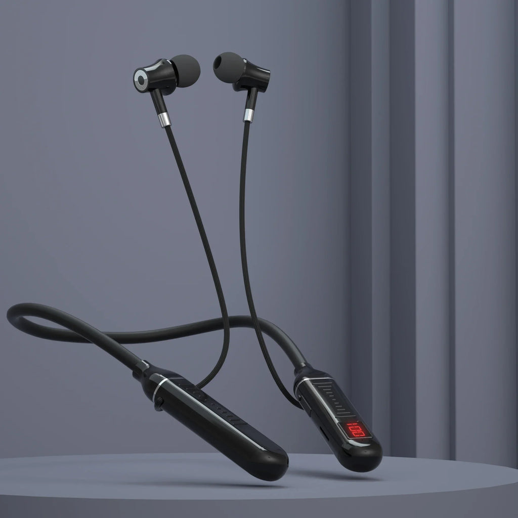 Black earbud headphones with a control unit on a gray background