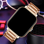 Smartwatch with a gold metal band on a dark background