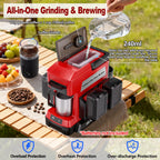 Red and black coffee grinder and brewer on a wooden table outdoors with coffee beans and fruits.