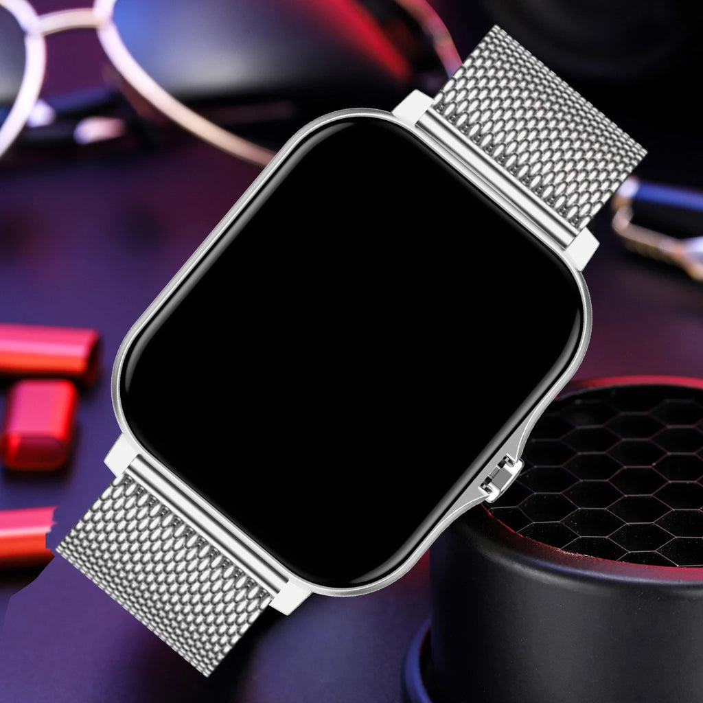 Silver smartwatch with a mesh band on a colorful background