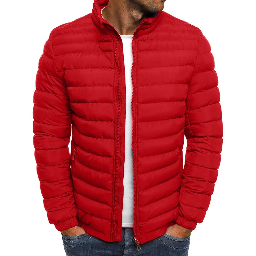 Red puffer jacket worn by a person on a white background