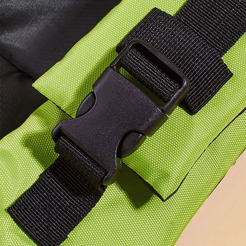Close-up of a black buckle on a green bag