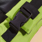 Close-up of a black buckle on a green bag