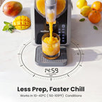 Norda juice maker dispensing orange juice into a glass with mangoes and lemons on a white background.
