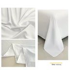 Collage of white fabric showing texture and folds on a neutral background.